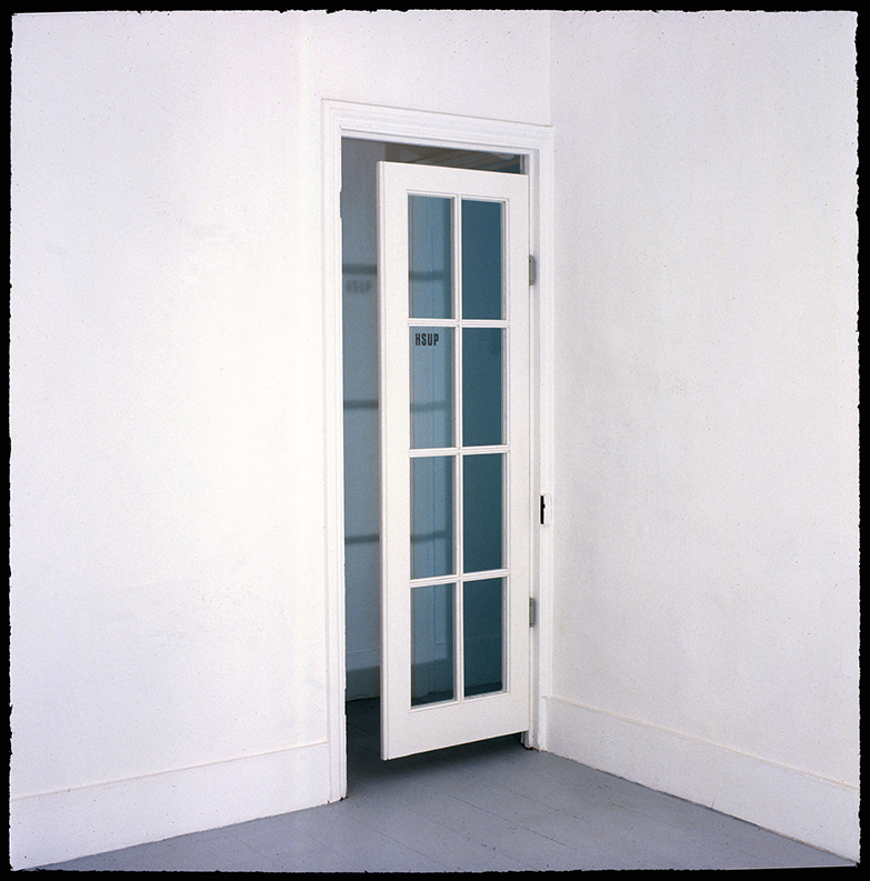 Paradoxical 'PUSH' sign on double swing door